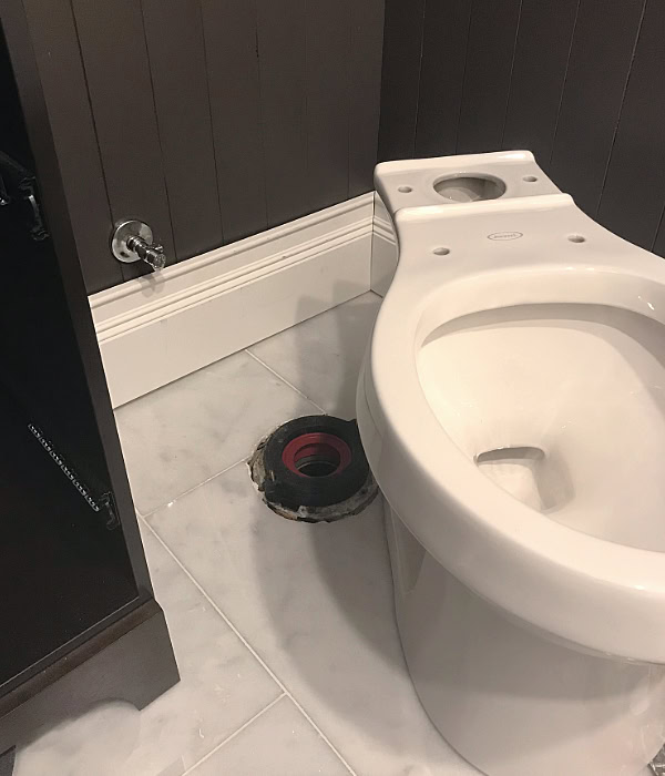 Toilet being installed